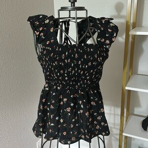 Size small black floral Ruffle cap Sleeve size small new without tags